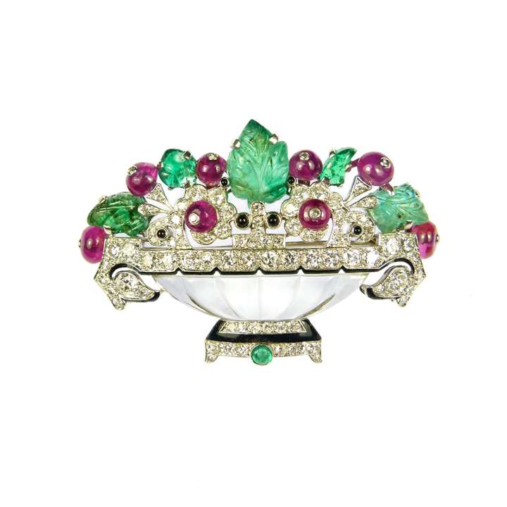 Carved emerald, ruby, diamond and rock crystal flower basket brooch by Cartier